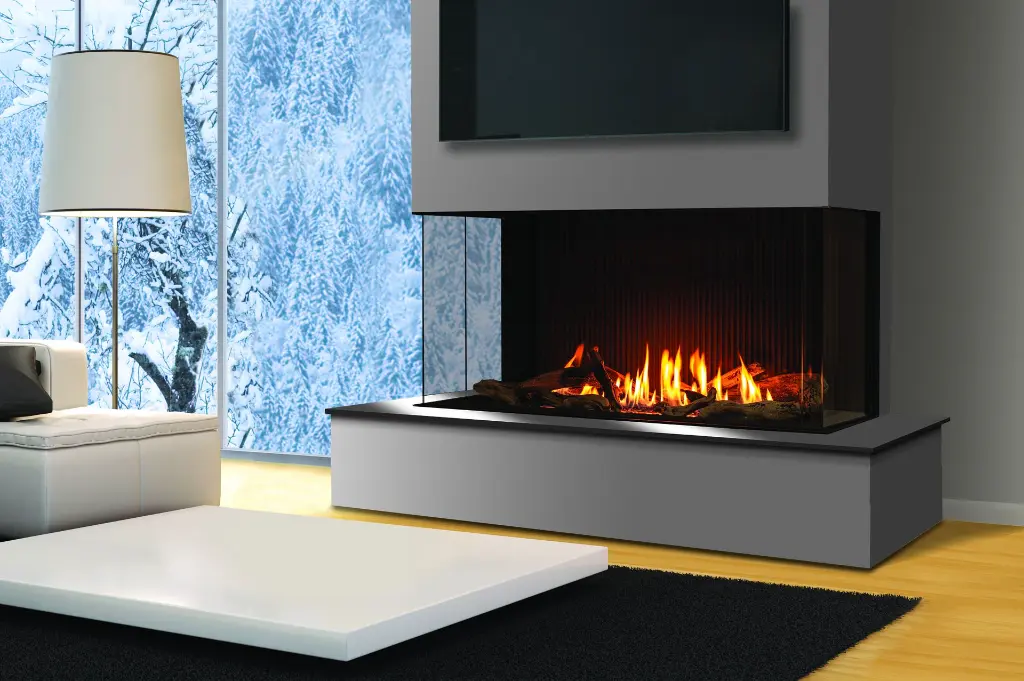 Foyer au gaz en baie Urbana U50 Tall installé sous une télévision, créant une ambiance moderne et chaleureuse avec un paysage d'hiver en arrière-plan.