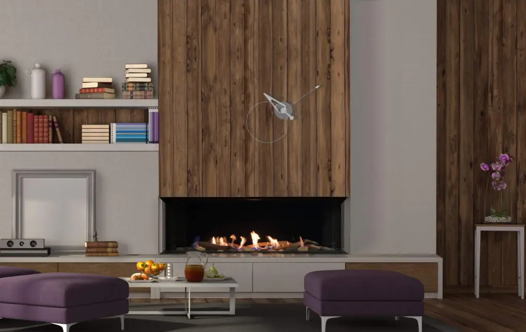 Foyer au gaz en baie à trois faces Galaxy 58 de Genesis, créant un point focal chaleureux dans un mur de boiseries de style Mid-Century Modern.