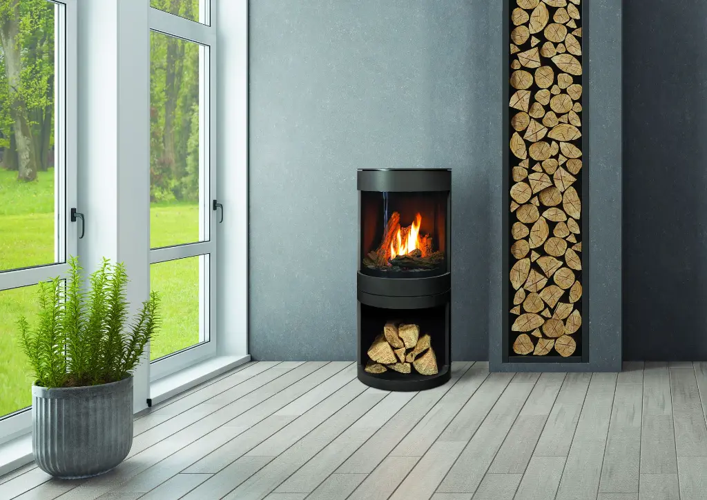 Poêle à gaz S50 de Marquis avec un piédestal intégrant un espace de rangement pour bûches décoratives, pour un look à la fois moderne et naturel.