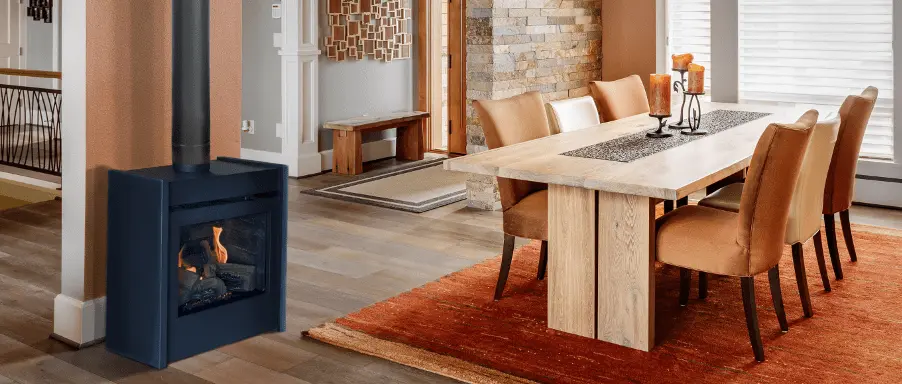 Poêle à gaz Westwood de Savannah au design minimaliste de couleur bleue, ajoutant une touche contemporaine et un chauffage efficace à une salle à manger.